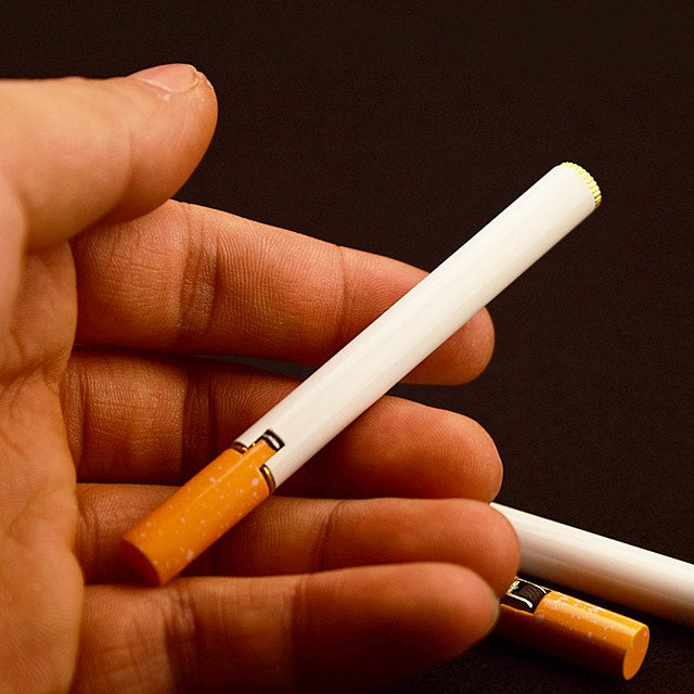 Cigarette-shaped compact lighter