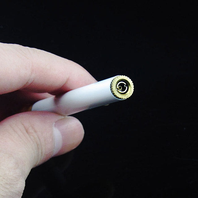 Cigarette-shaped compact lighter